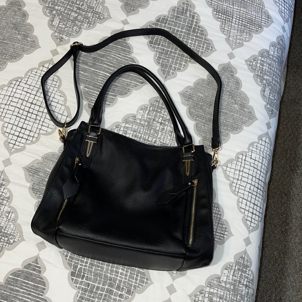 Black shoulder bag with gold hardware